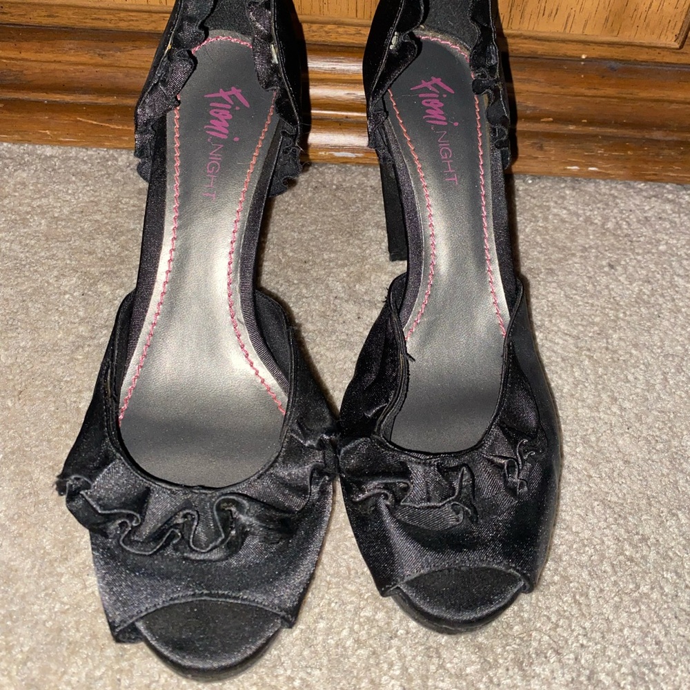 Worn black dress shoes
